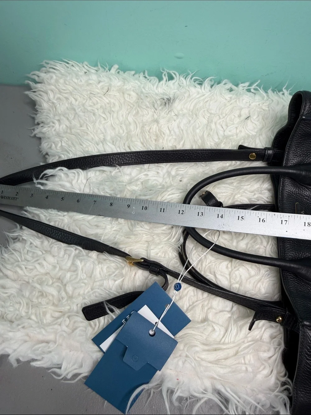 Authentic Prada Black  Leather Satchel with Gold Logo .